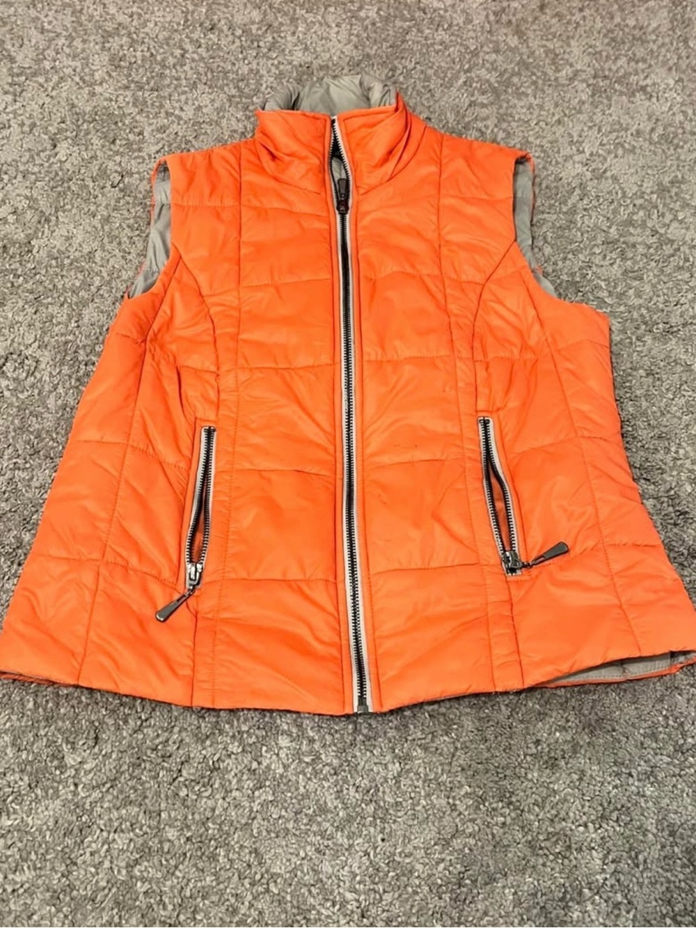 orange puffer vest
